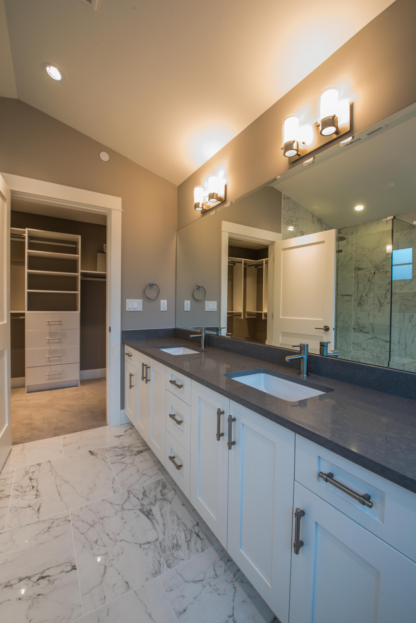 Maple shaker cabinets and quartz counter.